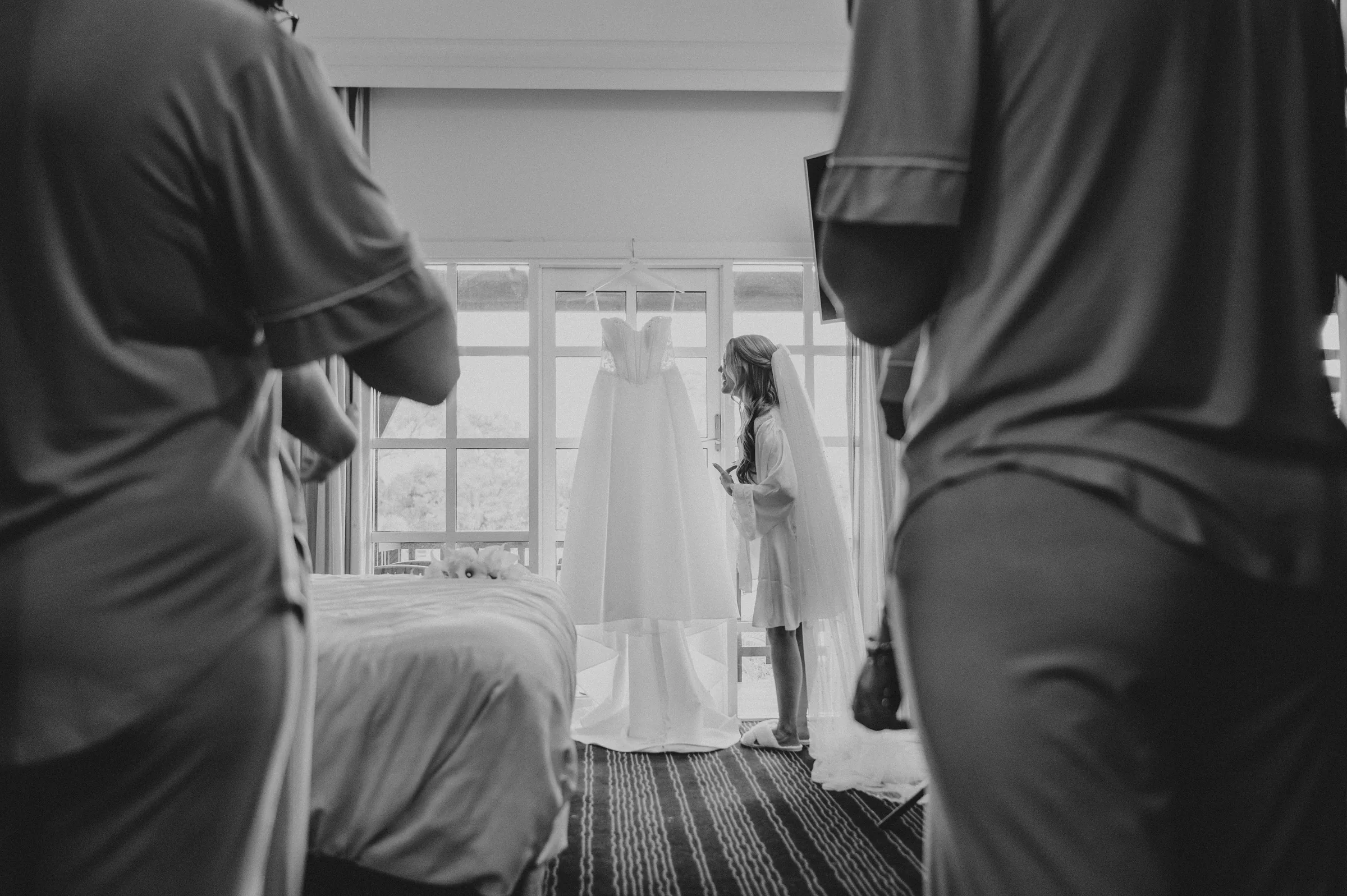 Black and white photo of Kirra getting ready with her bridesmaids at The Vines Resort