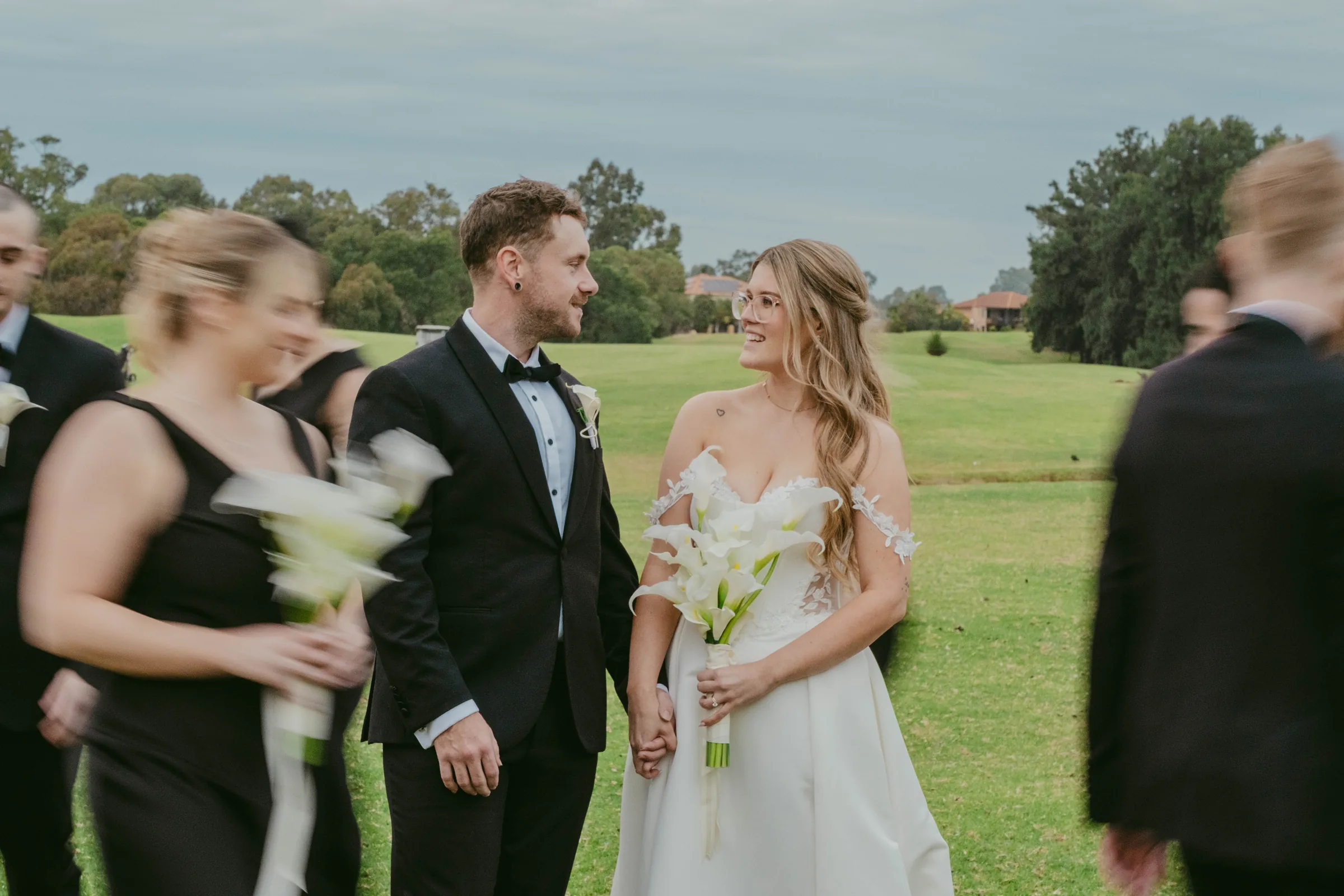 Mitch whispering to Kirra during a quiet moment in their Vines Resort wedding portraits