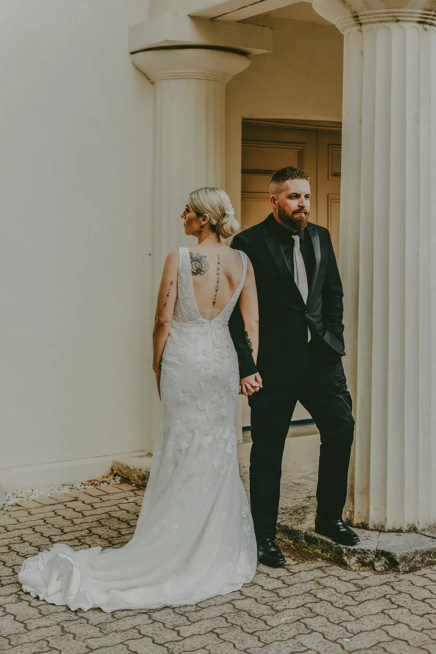 Detail of Chantelle's back tattoos while getting ready before her Perth wedding