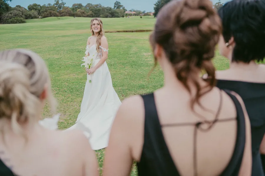Mitch reacting emotionally with his groomsmen before seeing Kirra at The Vines Resort